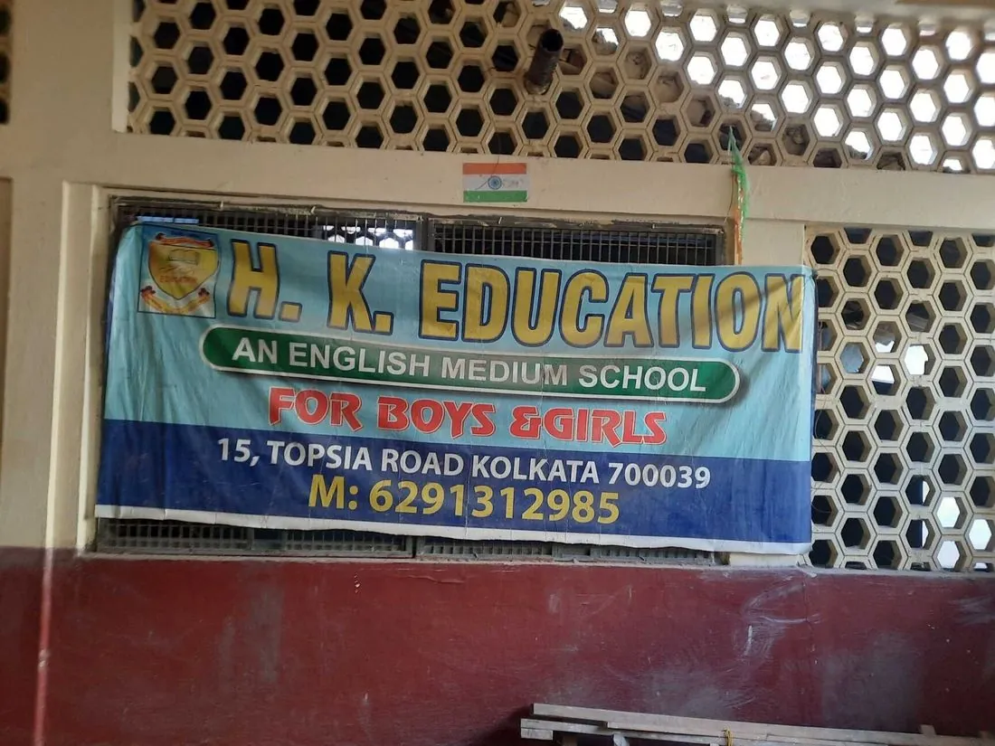 The H.K. Education banner on Topsia Road